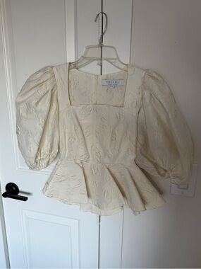 Hunter Bell Puff Sleeve Peplum Top in Ivory
